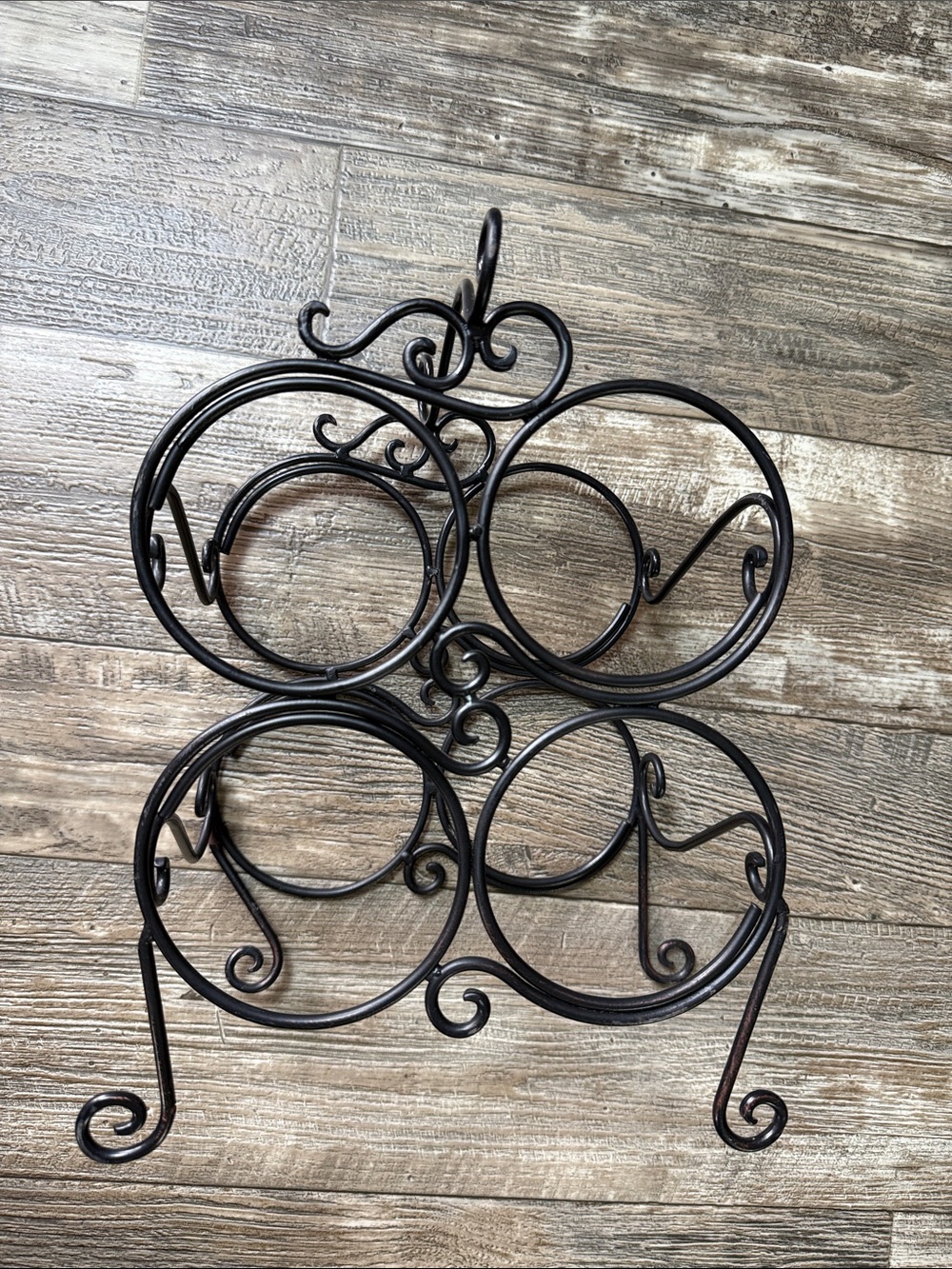 Decorative Black Metal Wall Wine Shelf - 4-Bottle Scroll Design